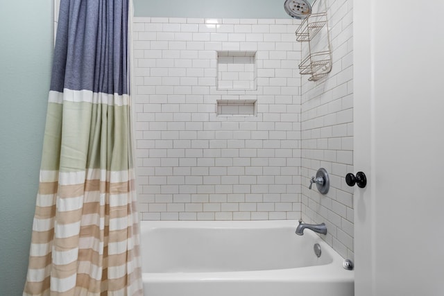 bathroom featuring shower / bath combination with curtain