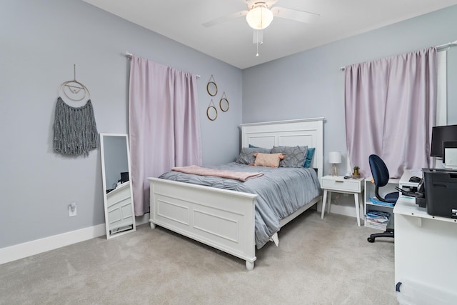 bedroom with light carpet and ceiling fan