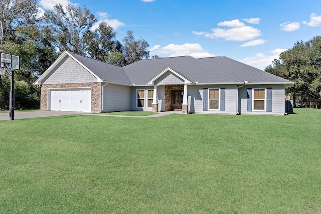 view of front of house with a garage and a front yard