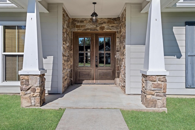 entrance to property featuring french doors