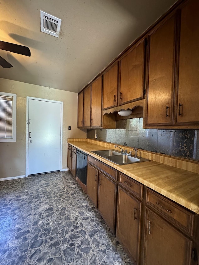 kitchen with dishwasher, ceiling fan, sink, and tasteful backsplash