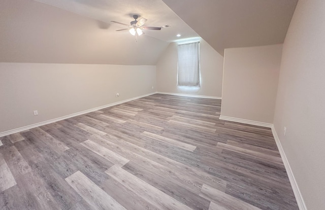308 Long Leaf St, Silsbee, TX 77656 - bonus room featuring lofted ceiling, baseboards, ceiling fan, and wood finished floors