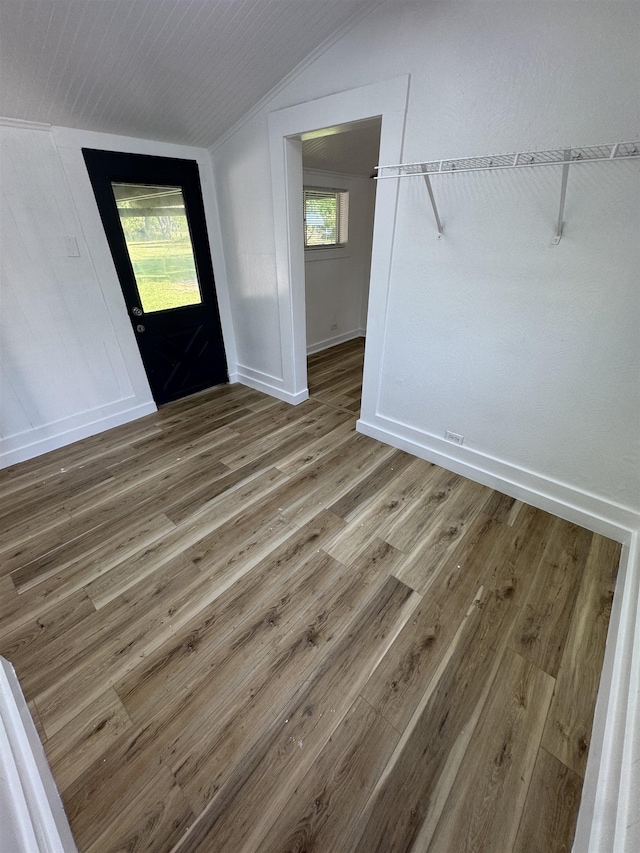 6250 Howe St, Groves, TX 77619 - entrance foyer featuring lofted ceiling and wood finished floors