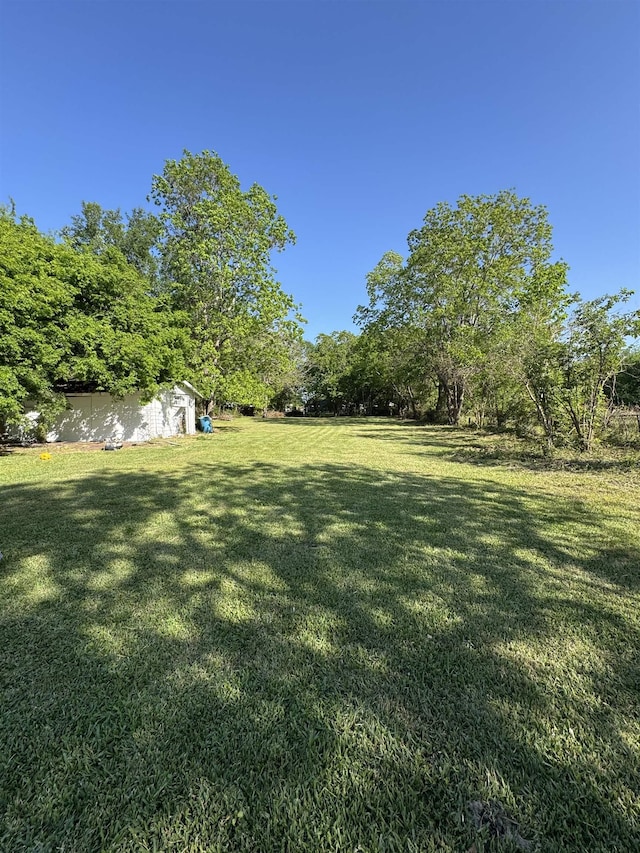 6250 Howe St, Groves, TX 77619 - view of green lawn