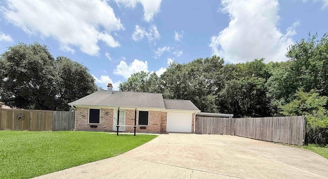 9410 Guy Cir, Beaumont, TX 77707 - view of front facade featuring concrete driveway, an attached garage, brick siding, and a chimney