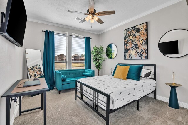 3435 Grey Hawk, Beaumont, TX 77707 - bedroom with light carpet, ornamental molding, ceiling fan, a textured ceiling, and baseboards