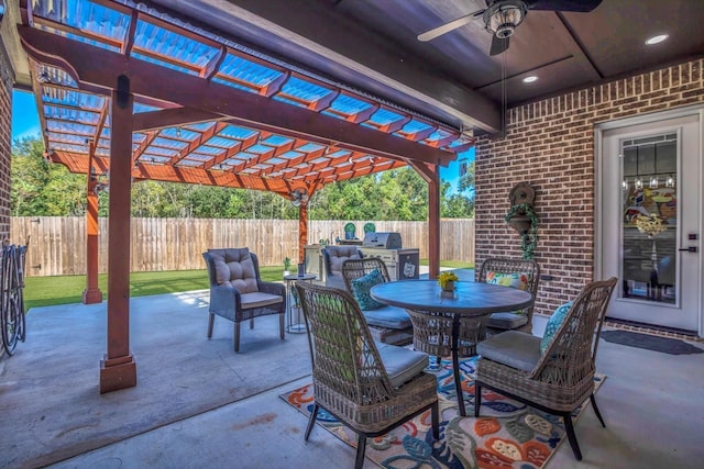 3435 Grey Hawk, Beaumont, TX 77707 - fenced backyard featuring a pergola, outdoor dining space, area for grilling, ceiling fan, and a patio