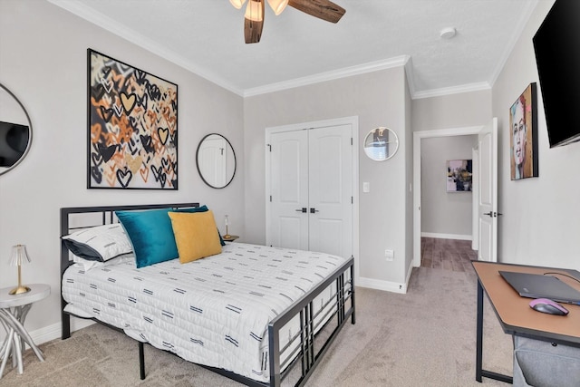 3435 Grey Hawk, Beaumont, TX 77707 - bedroom with light colored carpet, crown molding, baseboards, a closet, and a ceiling fan
