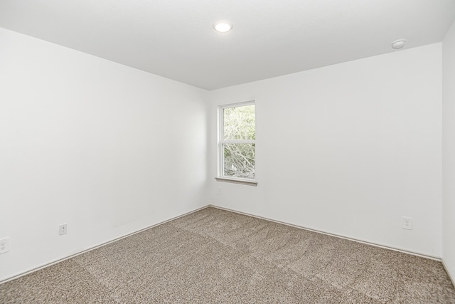 spare room with carpet flooring