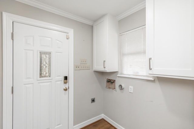 washroom with cabinets, crown molding, washer hookup, hookup for an electric dryer, and dark hardwood / wood-style flooring