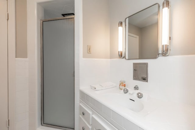 bathroom featuring vanity and walk in shower