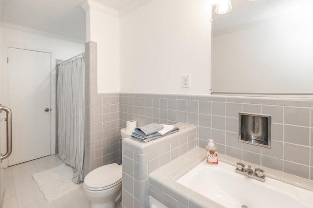 bathroom featuring walk in shower, ornamental molding, sink, tile patterned flooring, and toilet