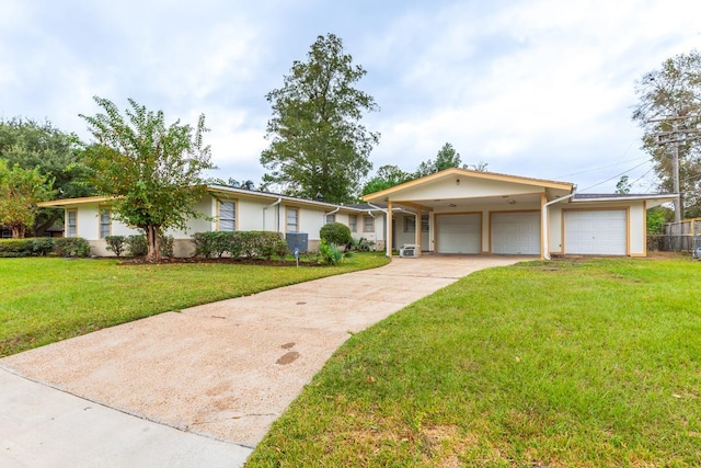 ranch-style house with a garage and a front yard