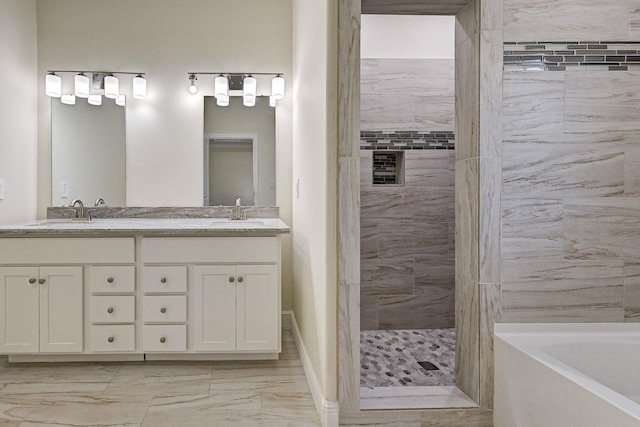 bathroom featuring shower with separate bathtub and vanity