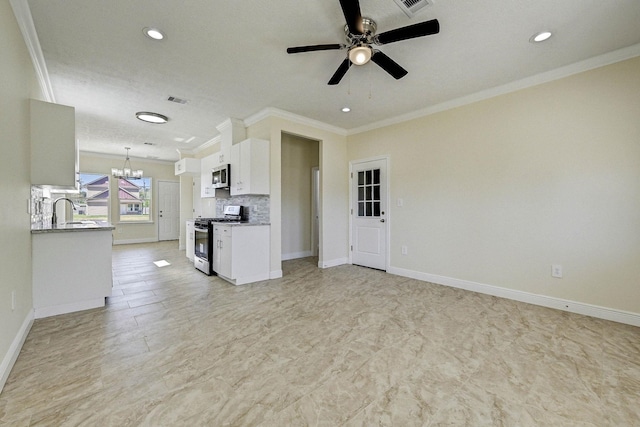 unfurnished living room with ceiling fan with notable chandelier, ornamental molding, and sink