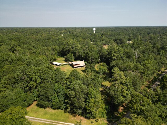 1205 Douglas St, Vidor, TX 77662 - aerial overview of property's location with a heavily wooded area