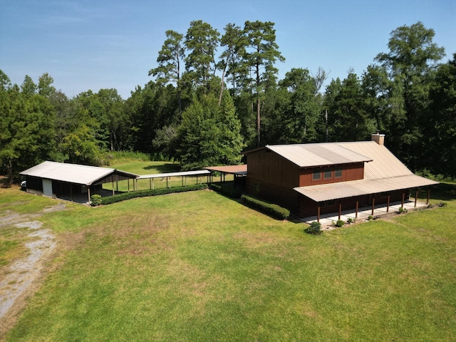 1205 Douglas St, Vidor, TX 77662 - aerial view of property and surrounding area with a forest