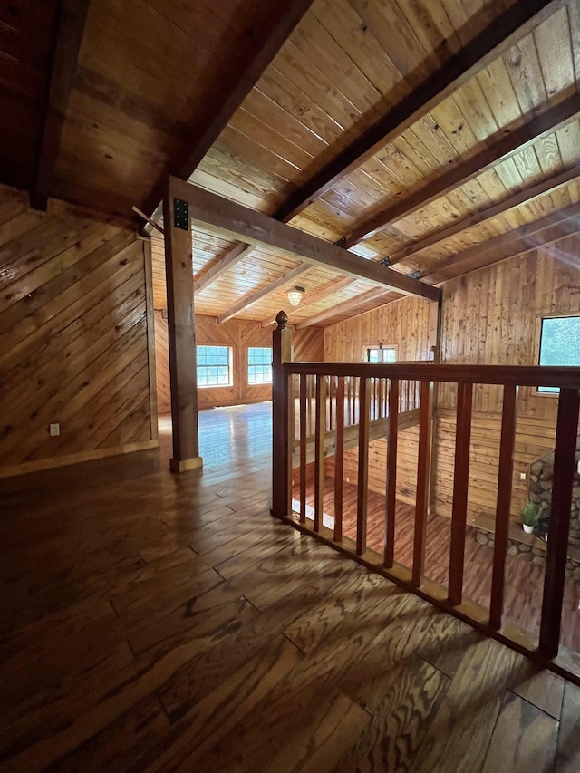 1205 Douglas St, Vidor, TX 77662 - corridor with wooden walls, dark wood-style flooring, and wooden ceiling