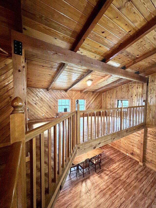 1205 Douglas St, Vidor, TX 77662 - hall featuring wood finished floors, a wooden ceiling with exposed beams, and wood walls