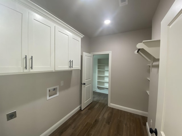 laundry area featuring washer hookup, dark hardwood / wood-style flooring, cabinets, and hookup for an electric dryer