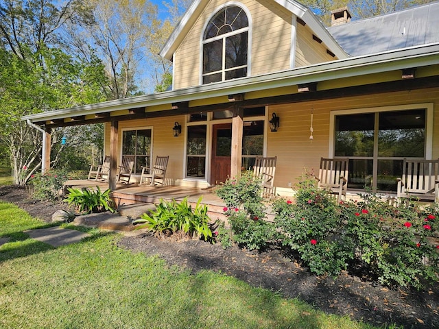 10309 Bussey Rd, Silsbee, TX 77656 - rear view of house with covered porch