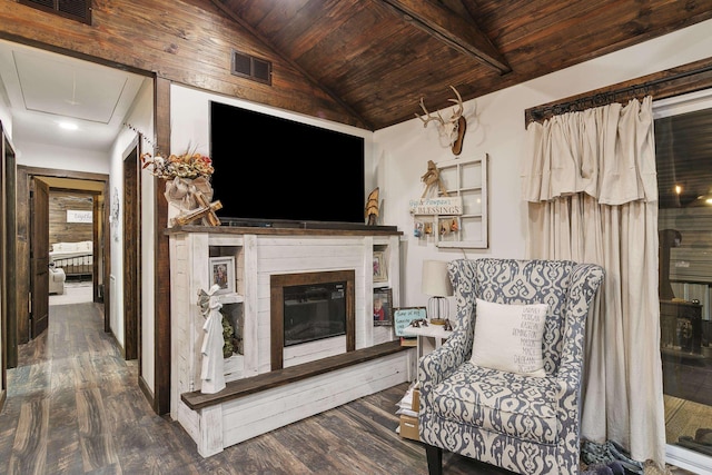 sitting room featuring lofted ceiling, dark hardwood / wood-style floors, wooden ceiling, and wood walls