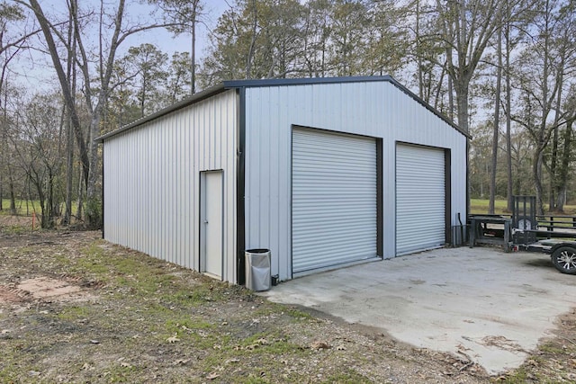 view of outdoor structure featuring a garage