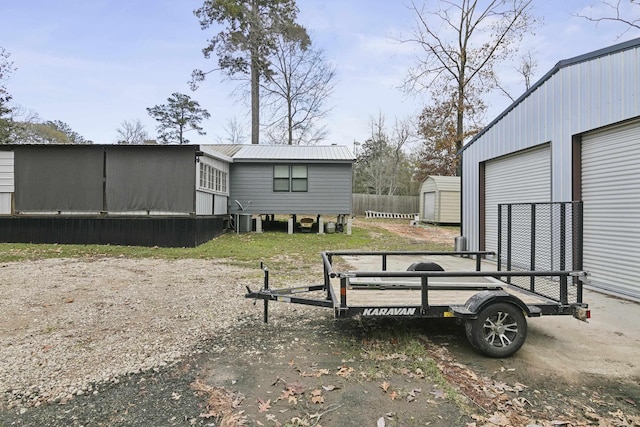 view of yard with a shed and central air condition unit