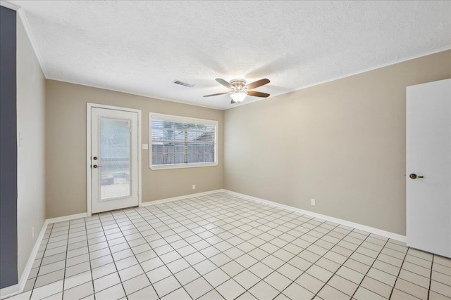 6250 Carnation Dr, Beaumont, TX 77706 - spare room with ceiling fan, a textured ceiling, baseboards, light tile patterned floors, and crown molding