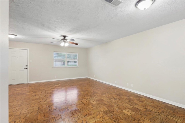 6250 Carnation Dr, Beaumont, TX 77706 - unfurnished room featuring a textured ceiling, a ceiling fan, and baseboards