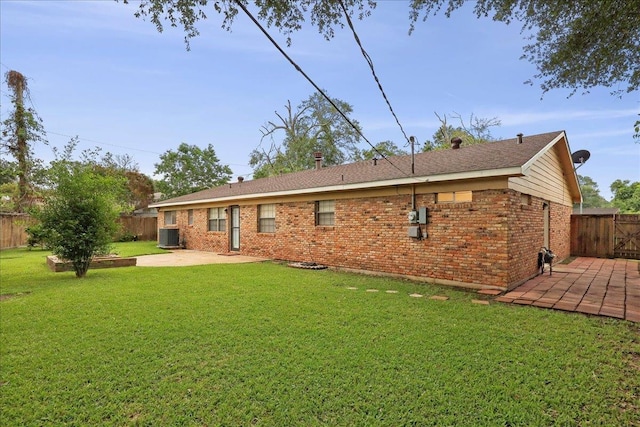 6250 Carnation Dr, Beaumont, TX 77706 - rear view of property featuring a patio area, brick siding, and cooling unit