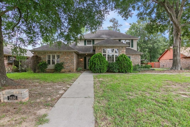 view of front facade with a front lawn