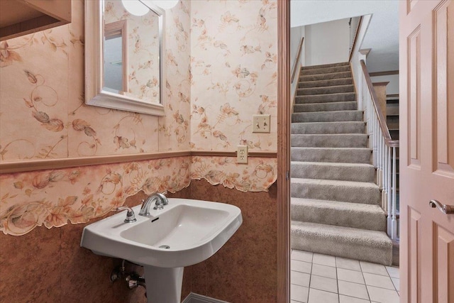 bathroom with tile patterned floors