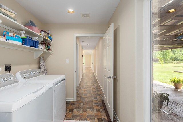 2360 County Road 2071, Hull, TX 77564 - clothes washing area with recessed lighting, stone finish flooring, washer and dryer, visible vents, and laundry area