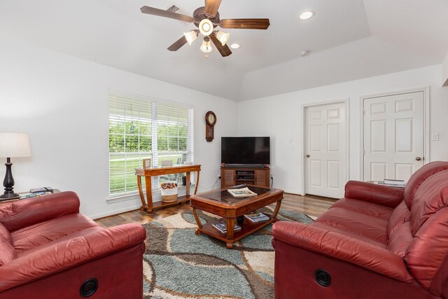 2360 County Road 2071, Hull, TX 77564 - living room featuring vaulted ceiling, ceiling fan, recessed lighting, and wood finished floors