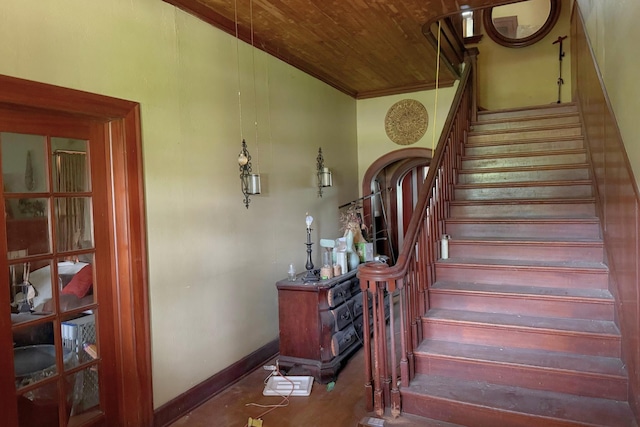 1010 Amarillo St, Beaumont, TX 77701 - staircase with wood ceiling and baseboards