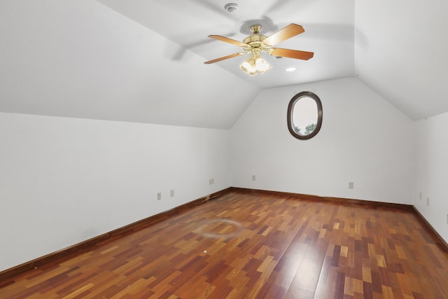 bonus room with dark hardwood / wood-style floors, ceiling fan, and lofted ceiling