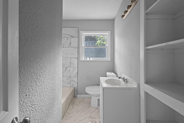 3015 Timberwood Ln, Beaumont, TX 77703 - full bathroom with toilet, marble look tiles, vanity, a textured wall, and tub / shower combination