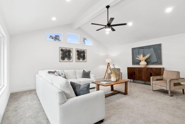 carpeted living room featuring vaulted ceiling with beams and ceiling fan