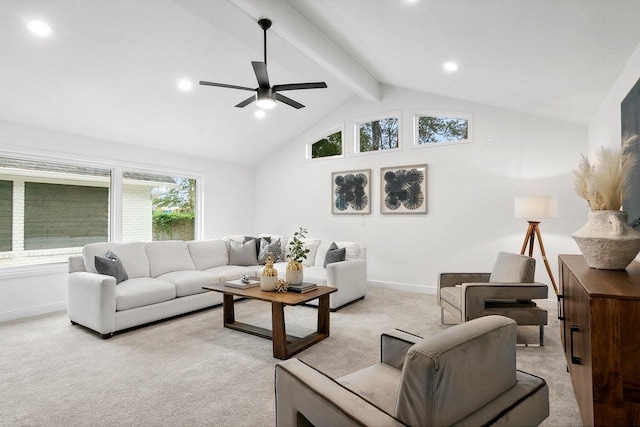 carpeted living room with lofted ceiling with beams and ceiling fan