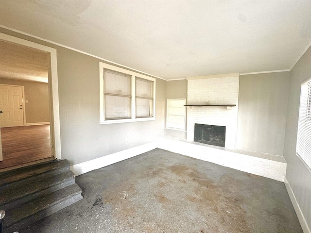 unfurnished living room featuring a fireplace