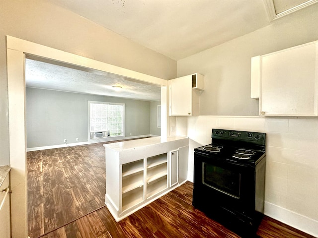 kitchen with white cabinetry, dark wood-type flooring, black electric range, and a textured ceiling