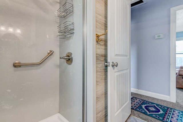 bathroom featuring walk in shower