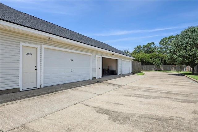 8076 Indian Blanket Dr, Beaumont, TX 77713 - garage with concrete driveway