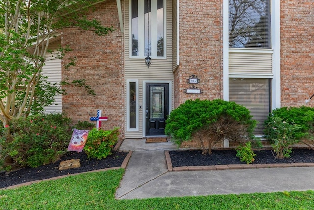 915 S 23rd St, Nederland, TX 77627 - doorway to property with brick siding