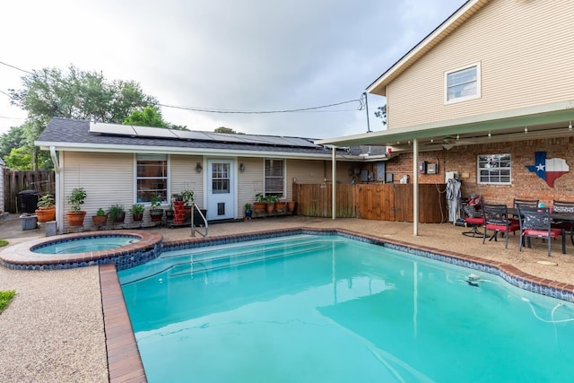 915 S 23rd St, Nederland, TX 77627 - view of pool with a patio area, a pool with connected hot tub, and fence