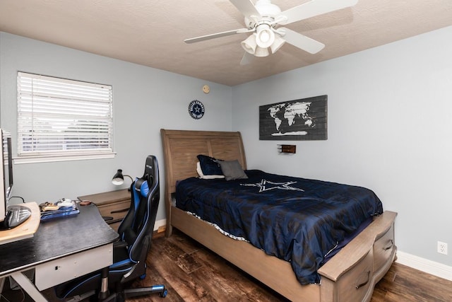 915 S 23rd St, Nederland, TX 77627 - bedroom with ceiling fan, baseboards, and wood finished floors