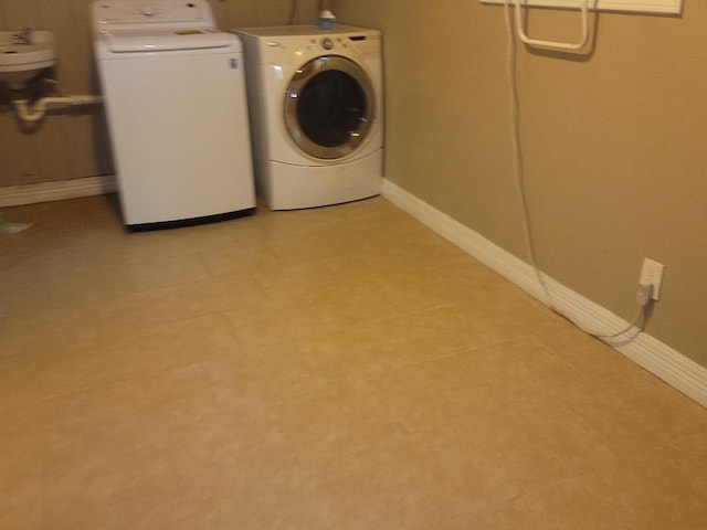 laundry area featuring separate washer and dryer