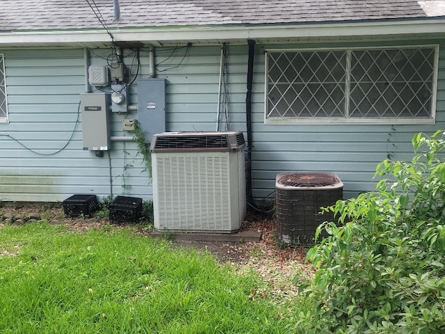 view of property exterior with central AC unit