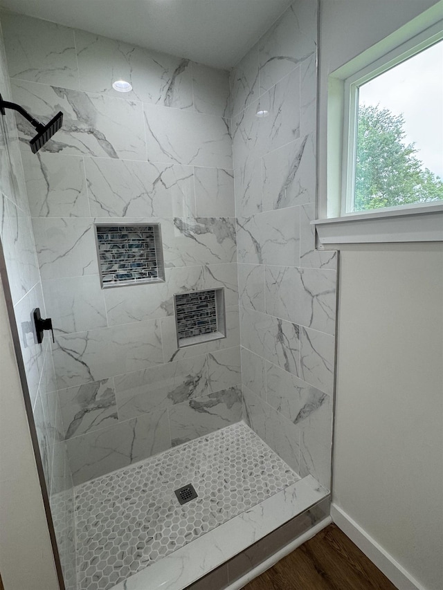 3128 58th St, Port Arthur, TX 77640 - full bathroom with tiled shower and wood finished floors
